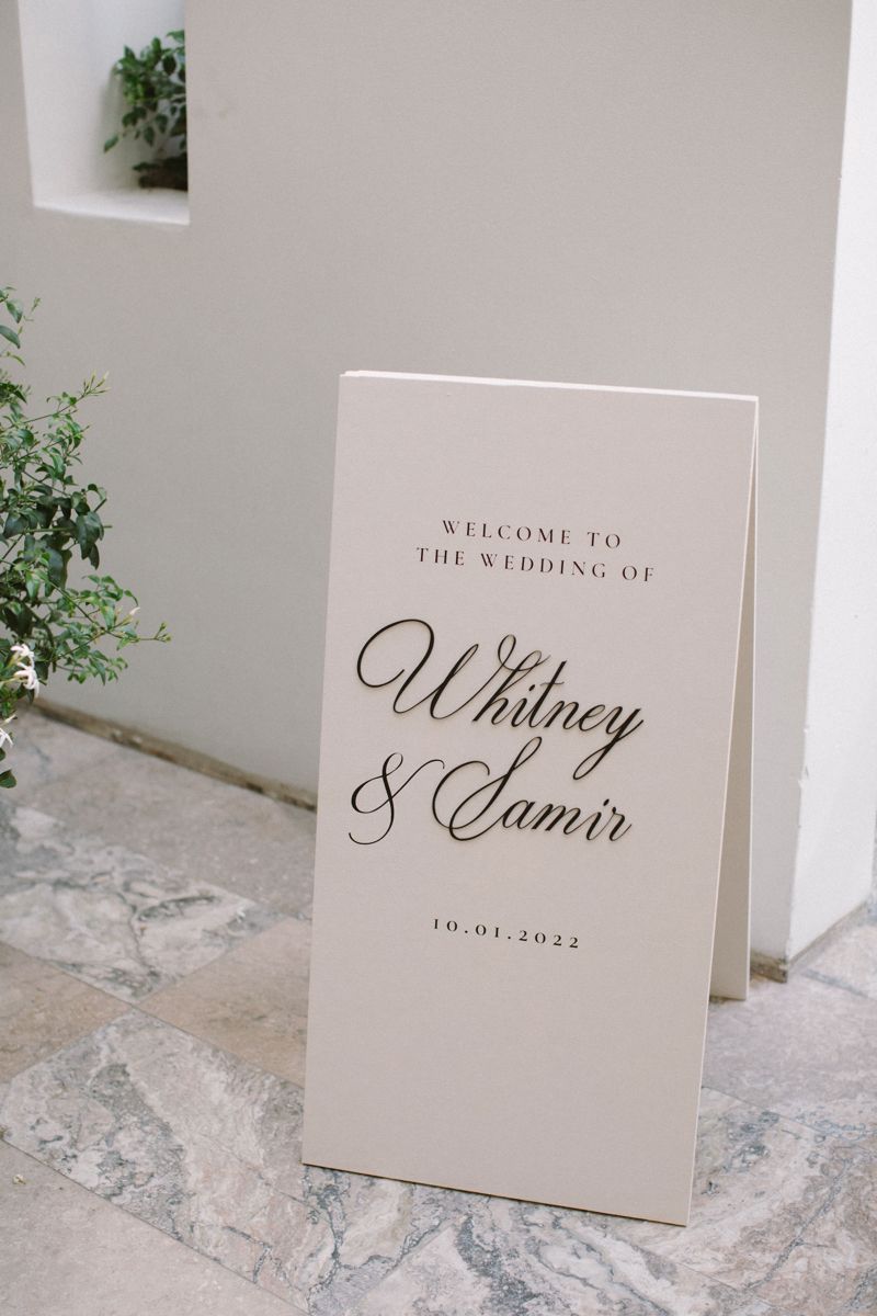 Elegant cream wedding sign with calligraphy Whitney & Samir